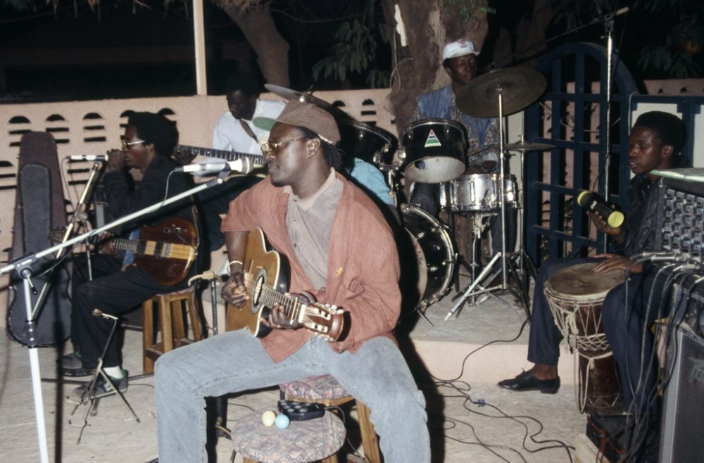 Habib performing with Bamada at Akwaba in Bamako (Eyre 1993)