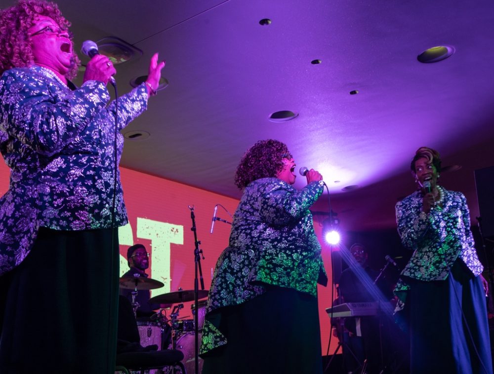In the hall's lobby, the Legendary Ingramettes kicked off the night with a rousing and rowdy gospel set. Backed by a guitar-based combo, these three ladies delivered full force, in-your-face spiritual fire.
